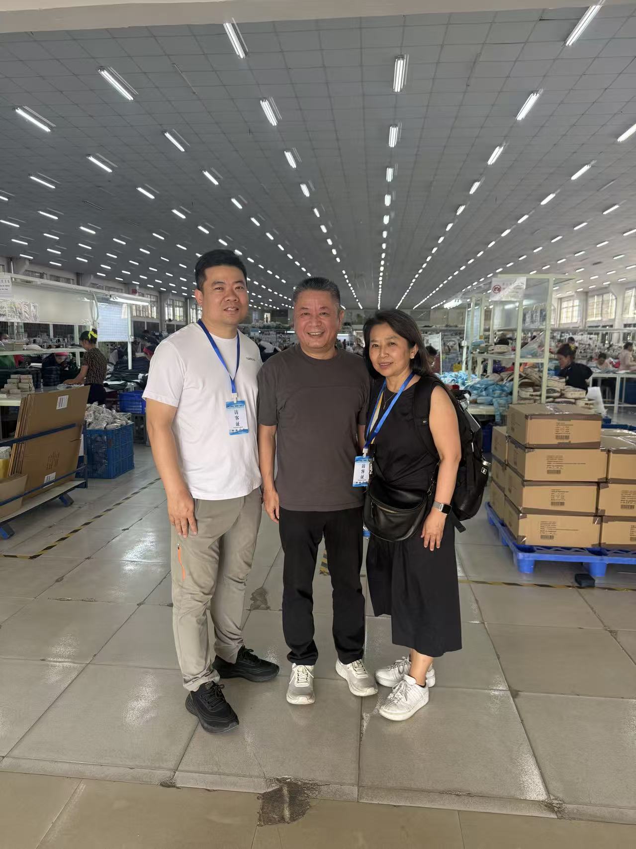 Jin Chi team visiting a bag production partner in Cambodia